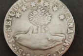 This coin is very old and rare for the state of Bolivia.