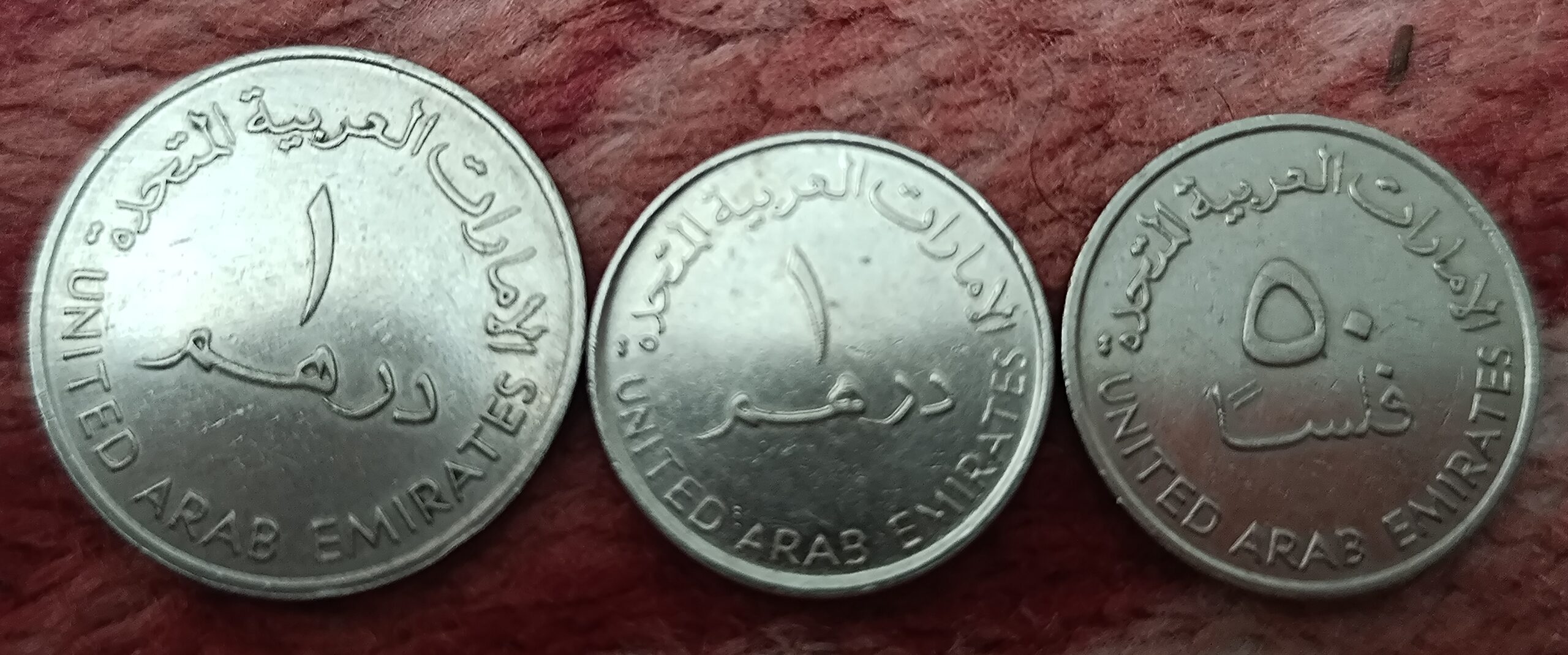 Valuable and old coins 50 fils 1 dirham of the United Arab Emirates To receive other old coins and exchange prices, send a message to WhatsApp below. WhatsApp: +989173057206